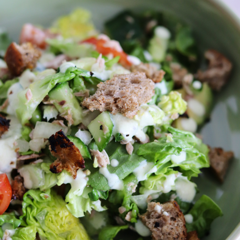 Caesar salad with tuna and croutons
